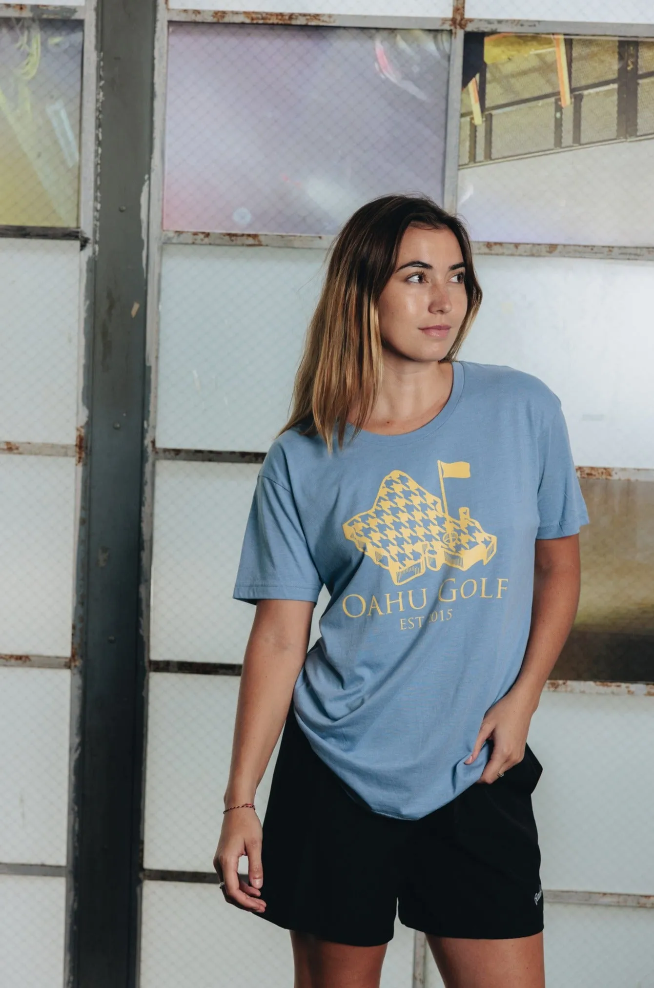 "Island Houndstooth" - OGA Unisex Graphic Tee - Light Blue Heather